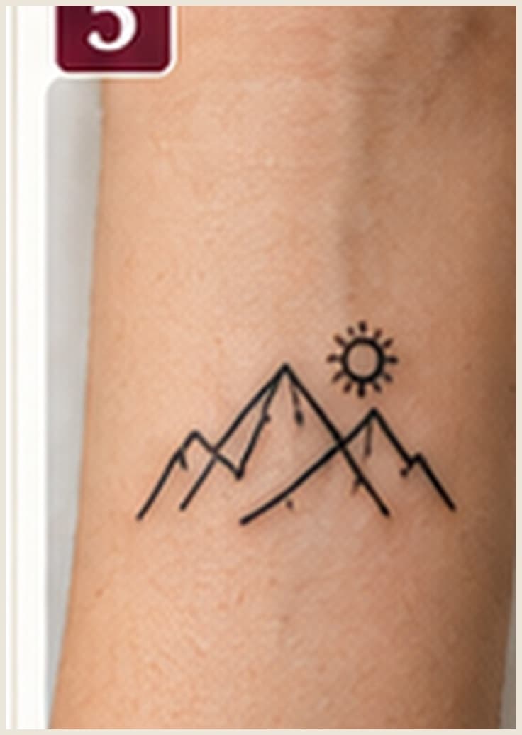 Minimalist tattoo — simple line mountains and sun on the forearm